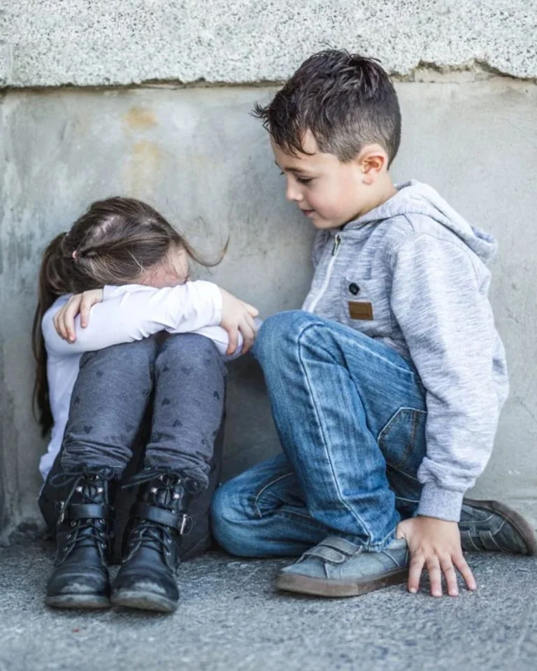 Boy sitting with sad little girl, Marsha Means, MA, Learn Empathy and Help Your Betrayed Wife Heal