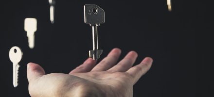 man's hand with multiple keys hovering above it Ever Accountable iOS update for accountability apps
