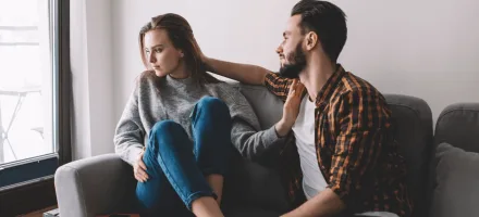 Couple sitting together, wife is sad, how to help your wife heal